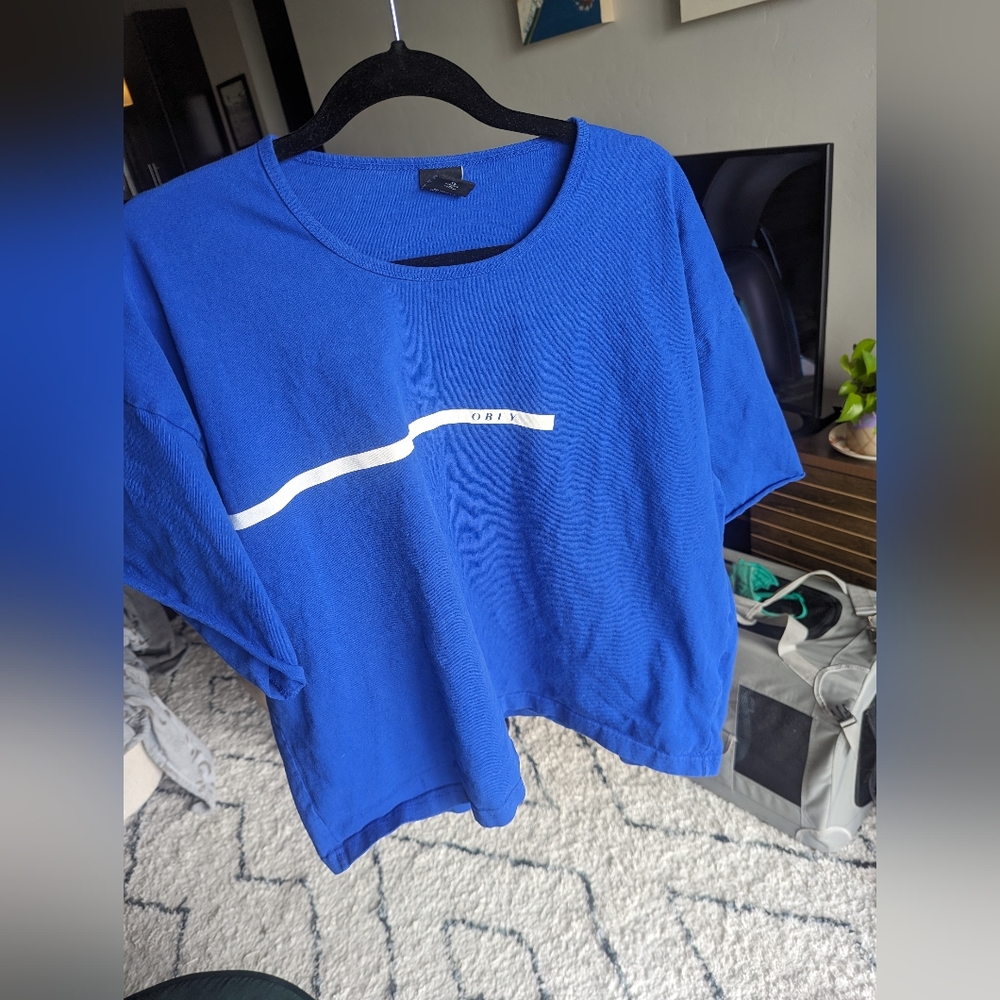 Royal blue OBEY shirt with rolled short sleeves, size XL
